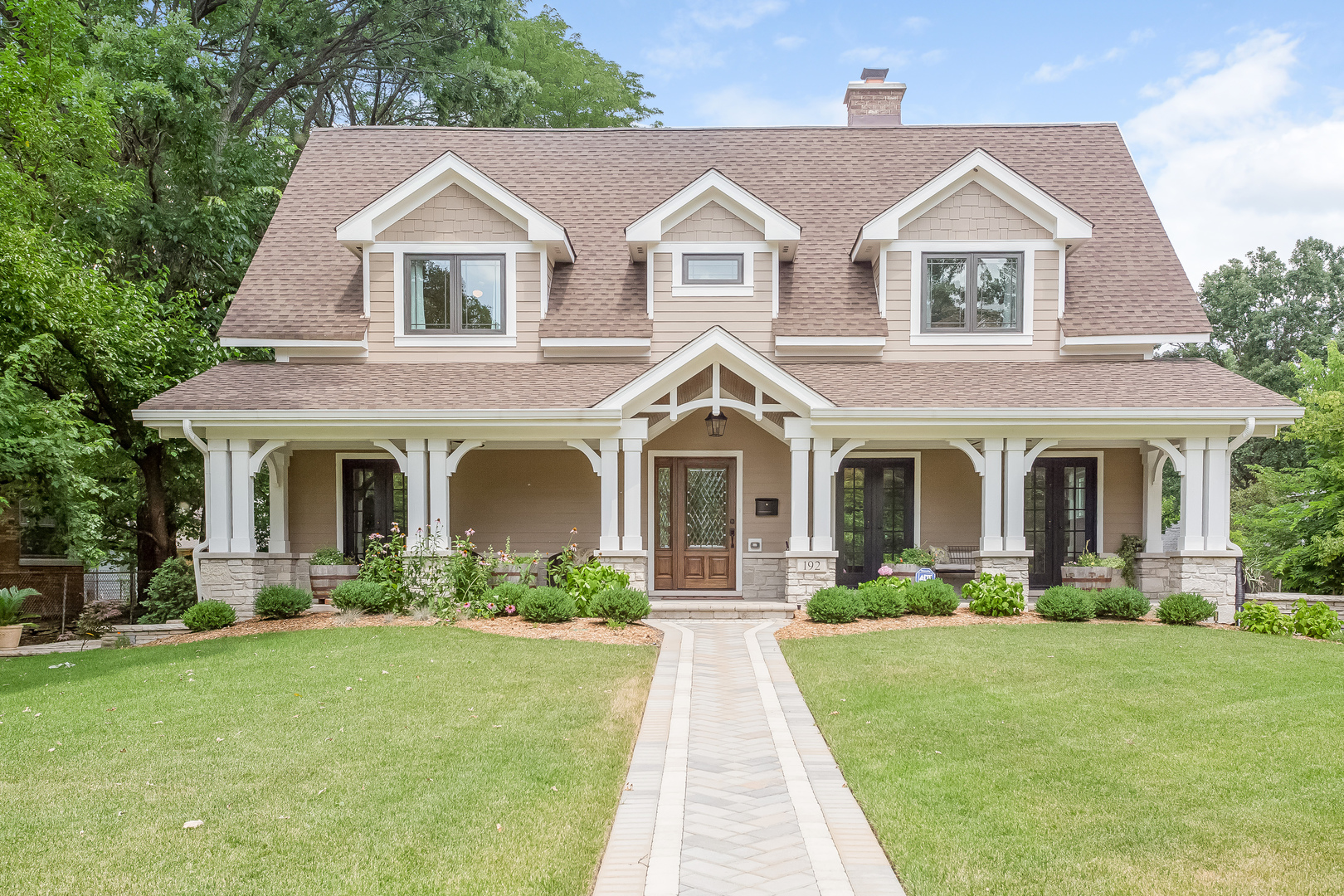 192 Riverside Road Riverside, IL 60546 - Photo 1 of 56 front view of a house with a yard