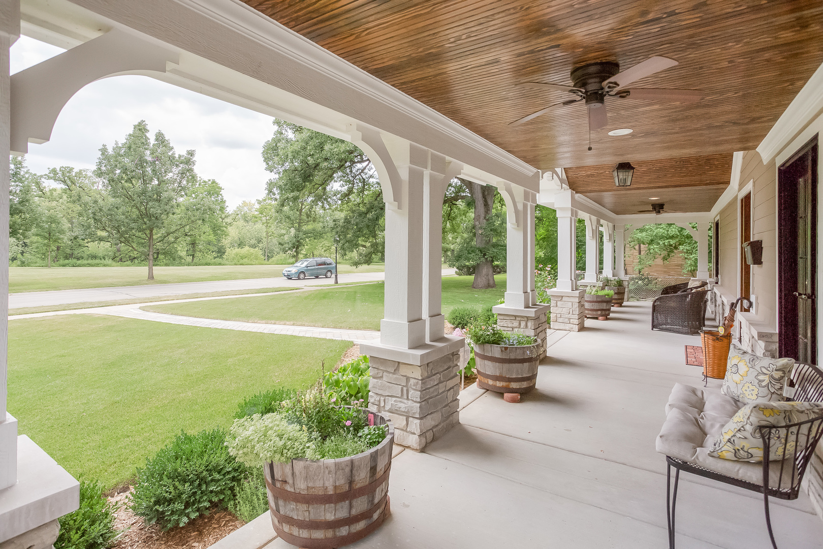 192 Riverside Road Riverside, IL 60546 - Photo 2 of 56 a living room with patio furniture and a garden