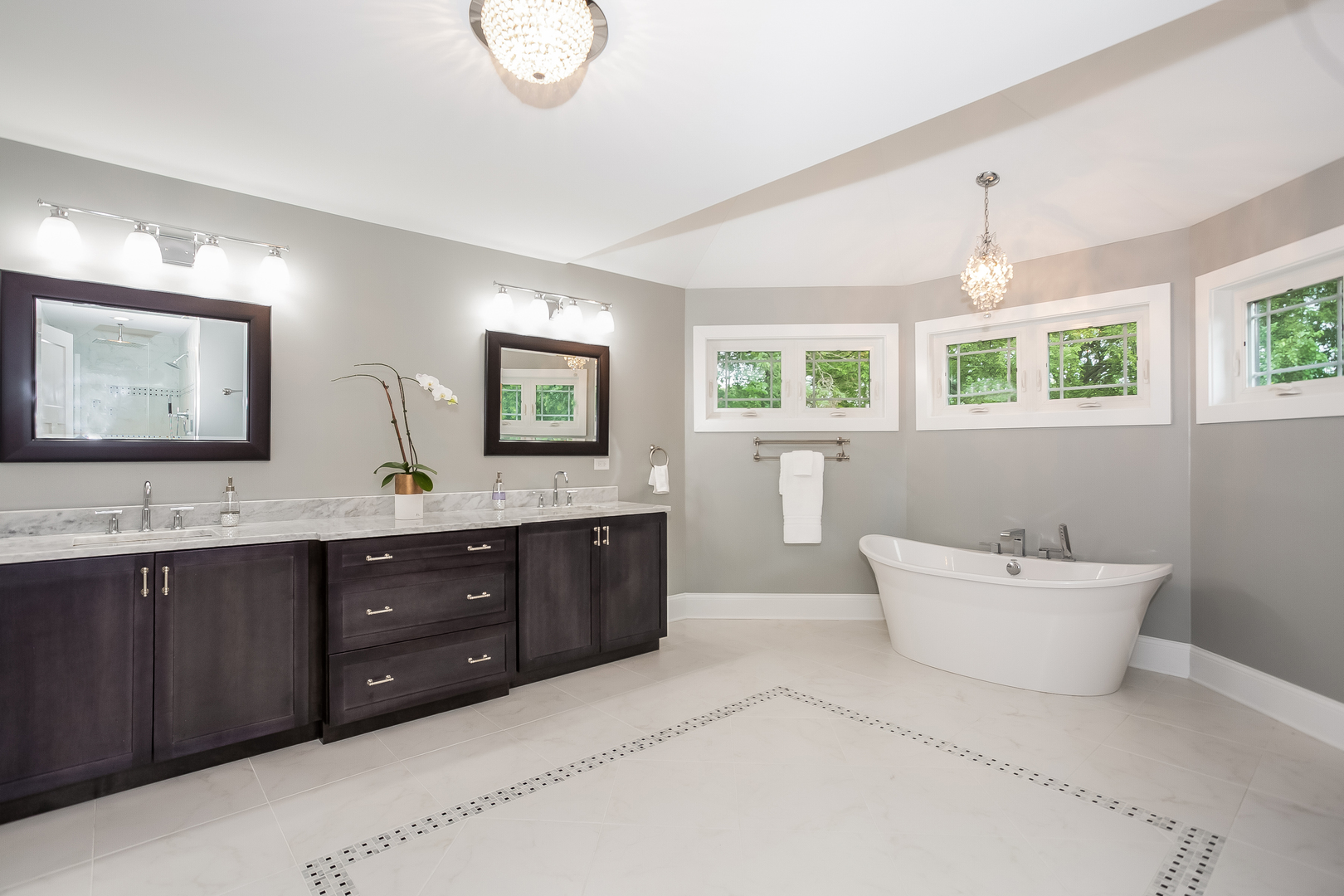 192 Riverside Road Riverside, IL 60546 - Photo 26 of 56 a spacious bathroom with a double vanity sink mirror and bathtub