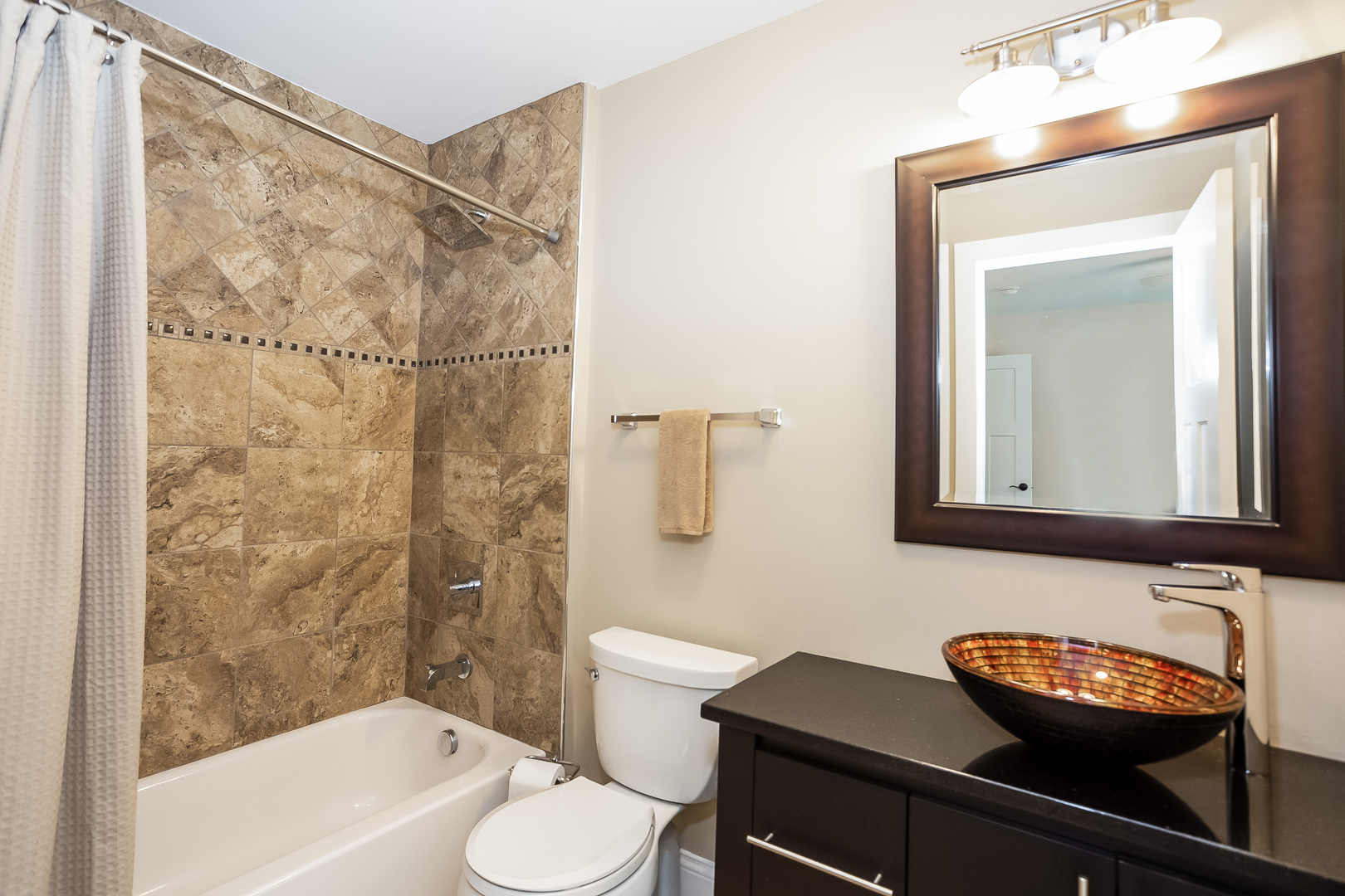 192 Riverside Road Riverside, IL 60546 - Photo 37 of 56 a bathroom with a sink a toilet and shower