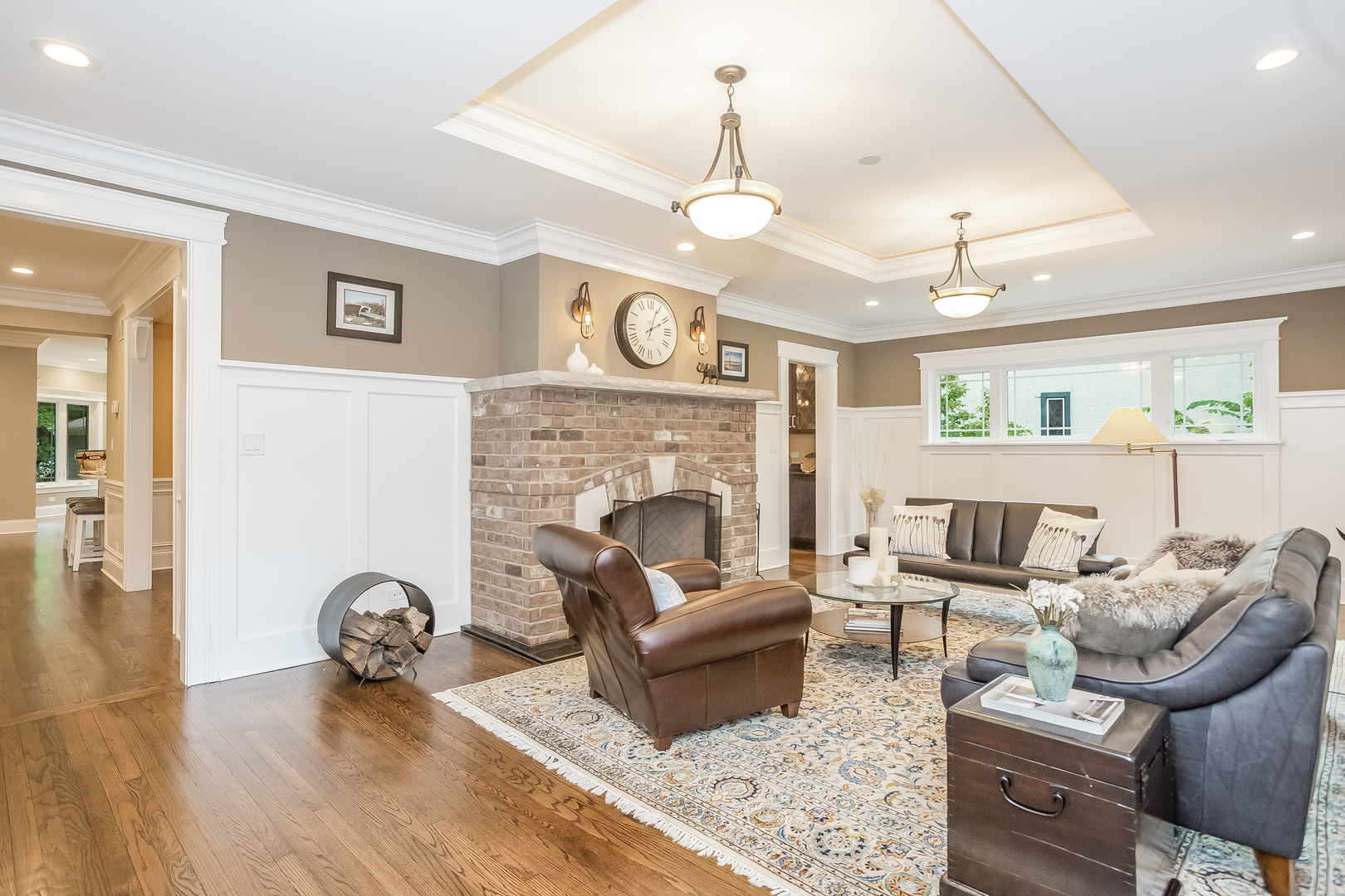 192 Riverside Road Riverside, IL 60546 - Photo 5 of 56 a living room with furniture and a fireplace