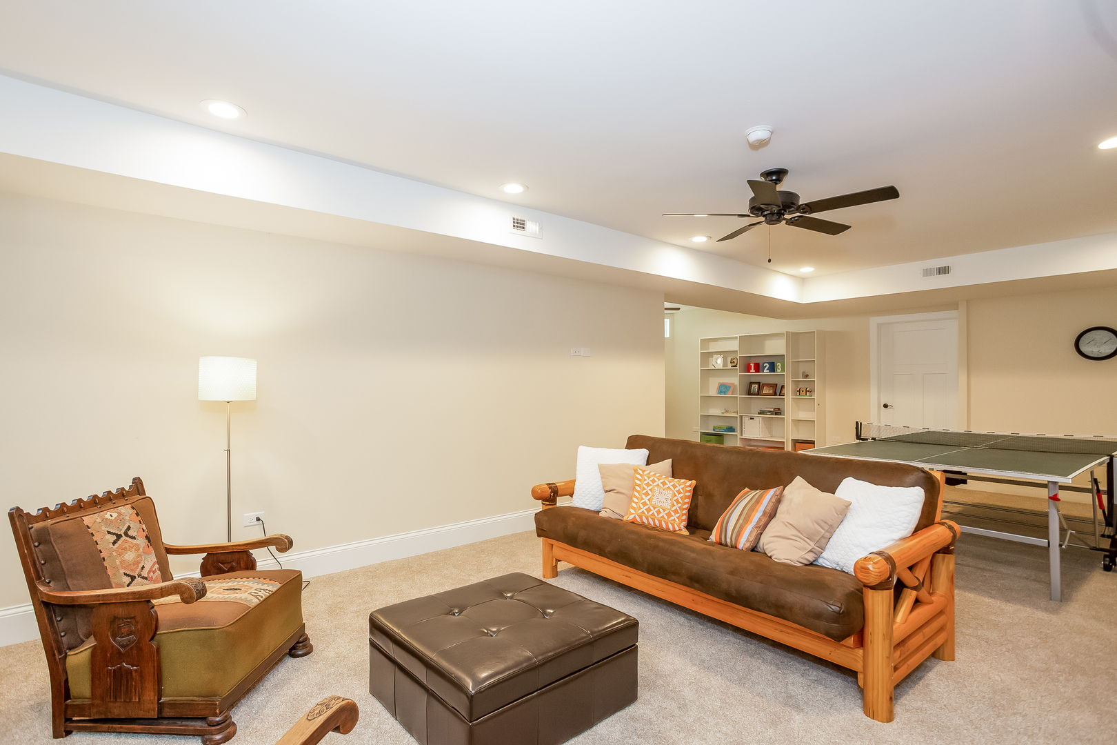 192 Riverside Road Riverside, IL 60546 - Photo 42 of 56 a living room with furniture and a ceiling fan