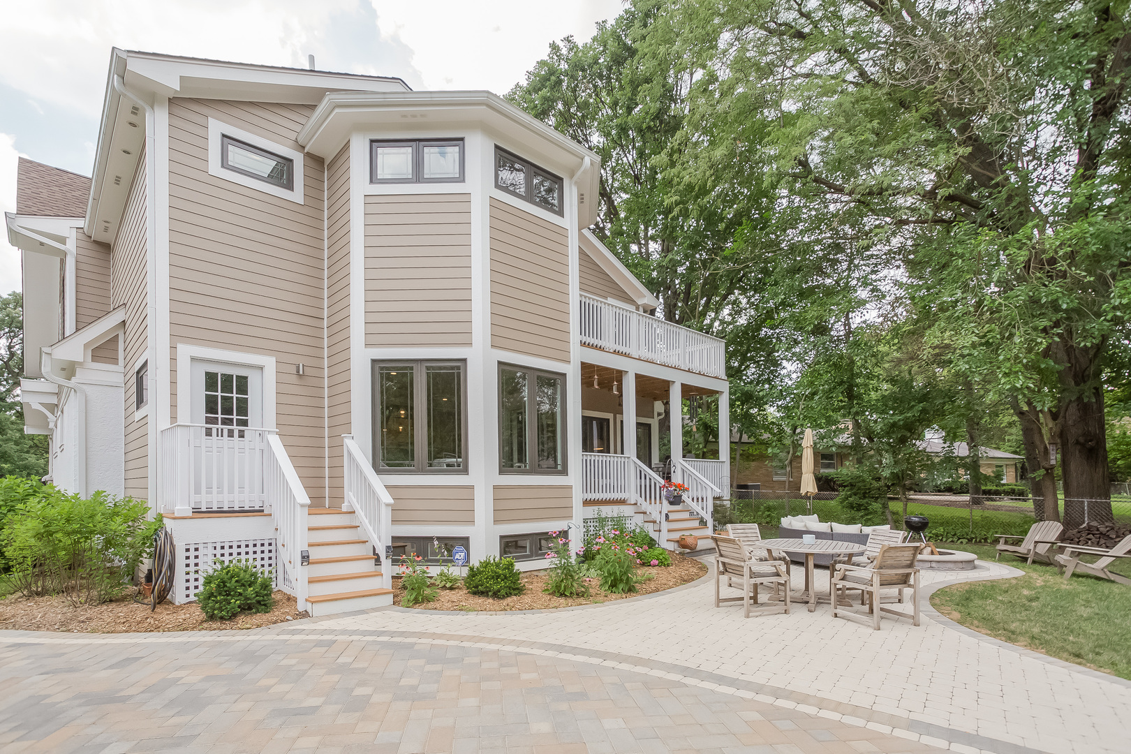 192 Riverside Road Riverside, IL 60546 - Photo 47 of 56 a view of a house with a patio