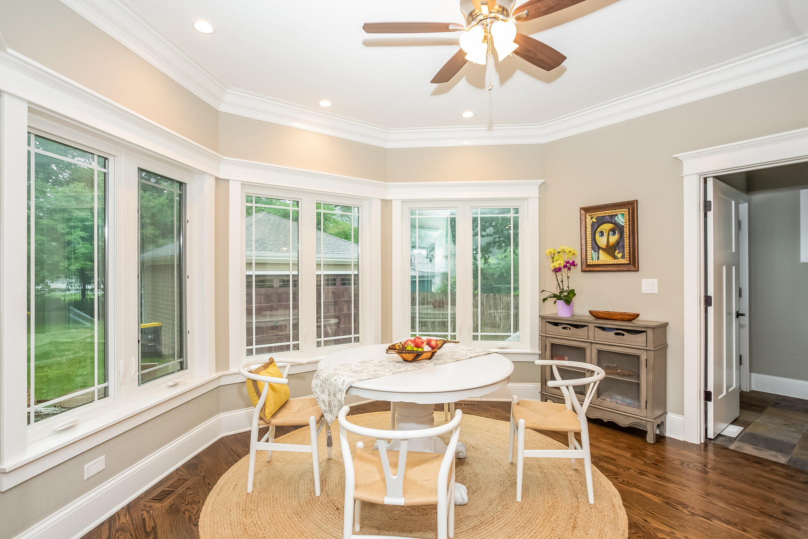 192 Riverside Road Riverside, IL 60546 - Photo 8 of 56 a table and chairs in a room with a large window