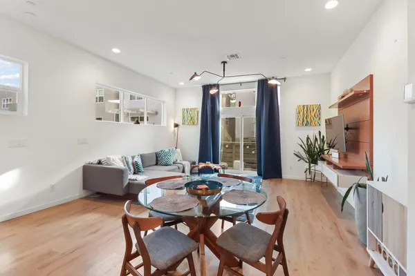 a view of a dining room with furniture