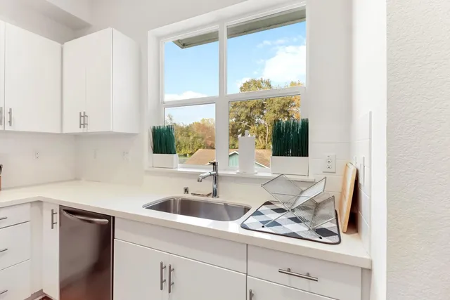 a bedroom with a bed and a walk in closet