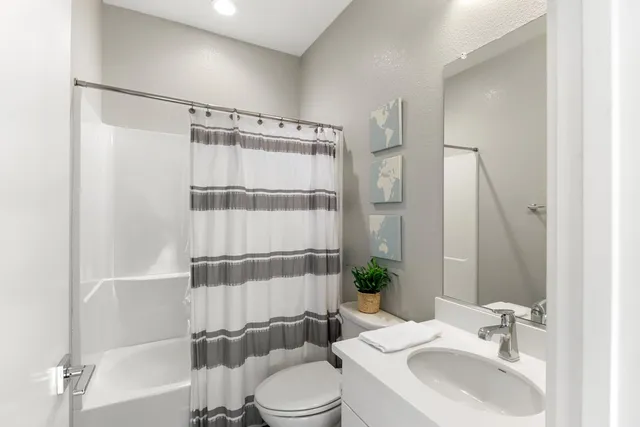 a view of a house with backyard porch and outdoor seating