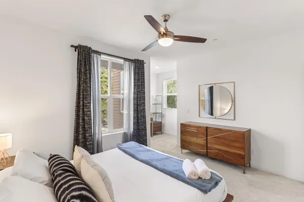 a view of a room that has a table and chair