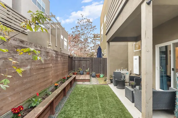 a house view with a backyard space