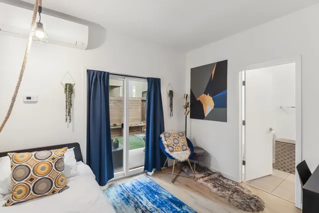 a bathroom with a shower and a toilet