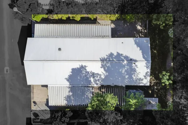 a front view of a house with garage