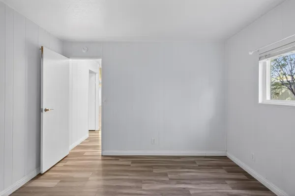 a bathroom with a sink vanity and mirror