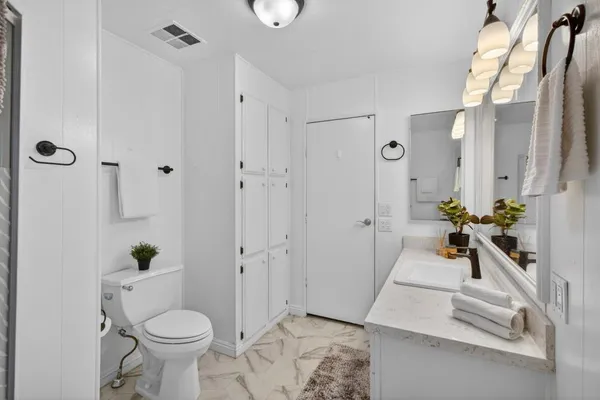 a house view with a backyard space