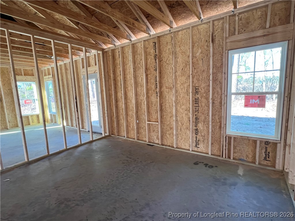 129 Traveller Way Raeford, NC 28376 - Photo 5 of 9 a view of an empty room with a window