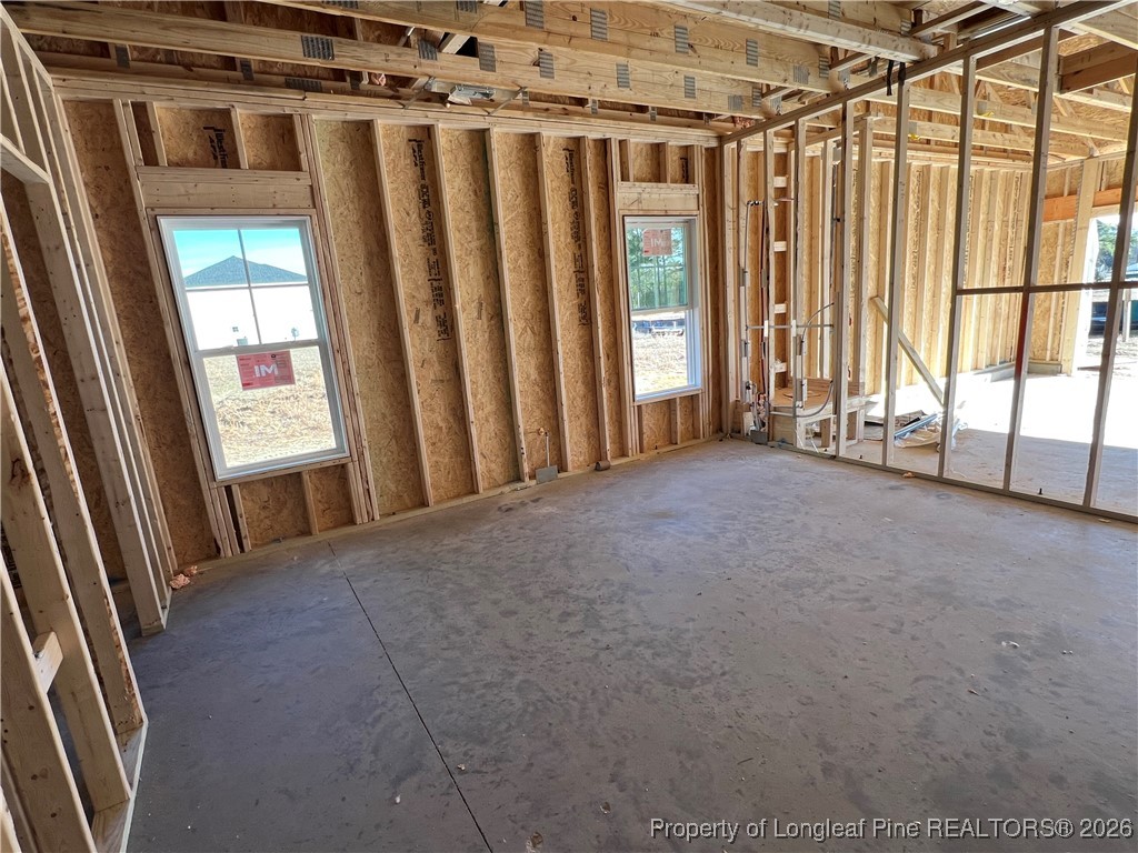 129 Traveller Way Raeford, NC 28376 - Photo 6 of 9 a view of an empty room with a window