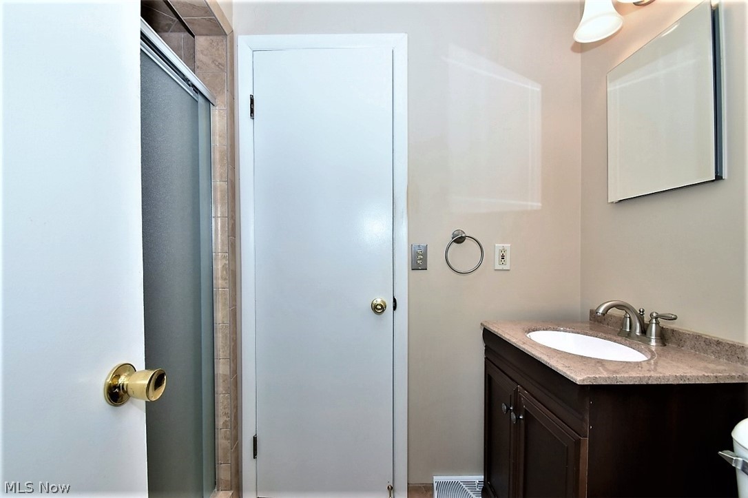 753 Esther Road Cleveland, OH 44143 - Photo 20 of 31 Master Bathroom has been remodeled and has full tile stall shower