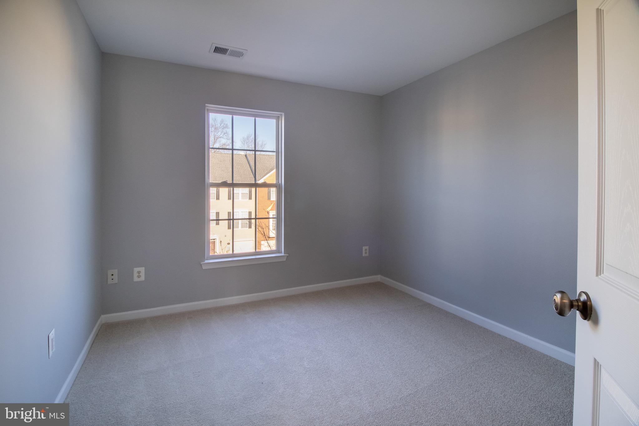 98 Lullwater Way Falling Waters, WV 25419 - Photo 28 of 43 an empty room with a window