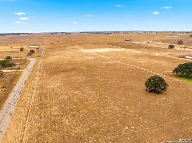 a view of a swimming pool and an outdoor space