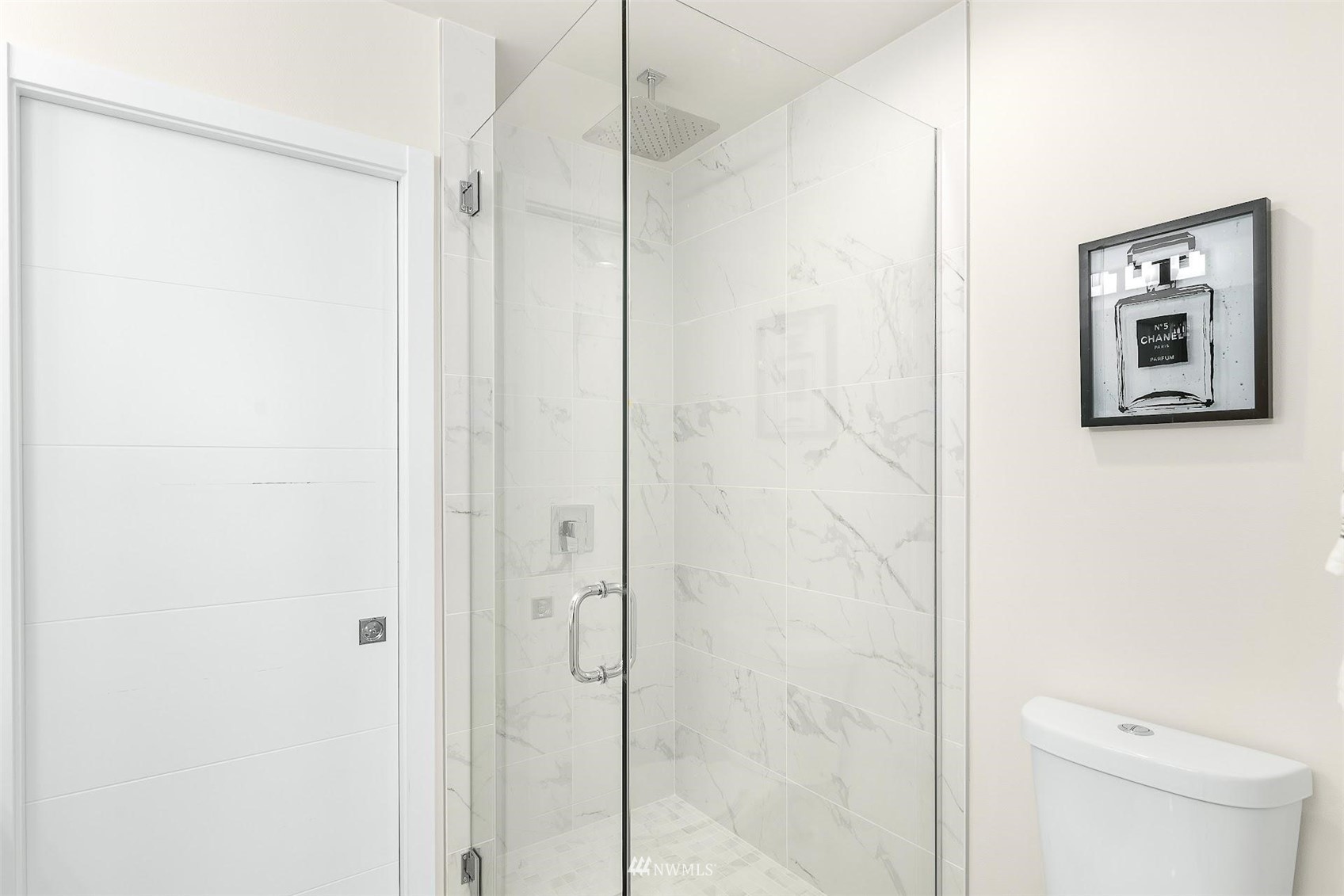 4125 Wallingford Avenue North Seattle, WA 98103 - Photo 16 of 28 a bathroom with a shower and a toilet