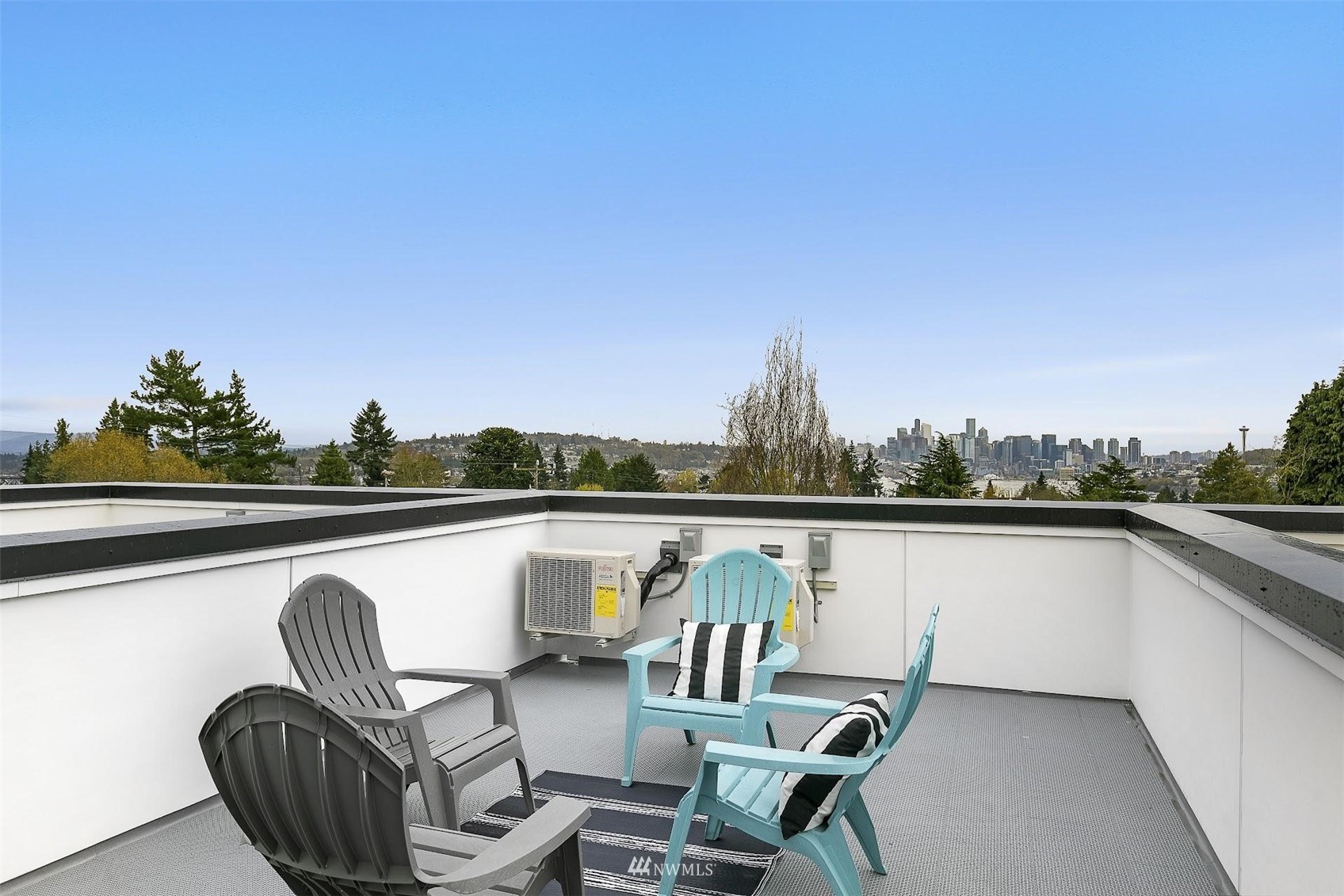 4125 Wallingford Avenue North Seattle, WA 98103 - Photo 24 of 28 a view of roof deck with seating space and barbeque oven