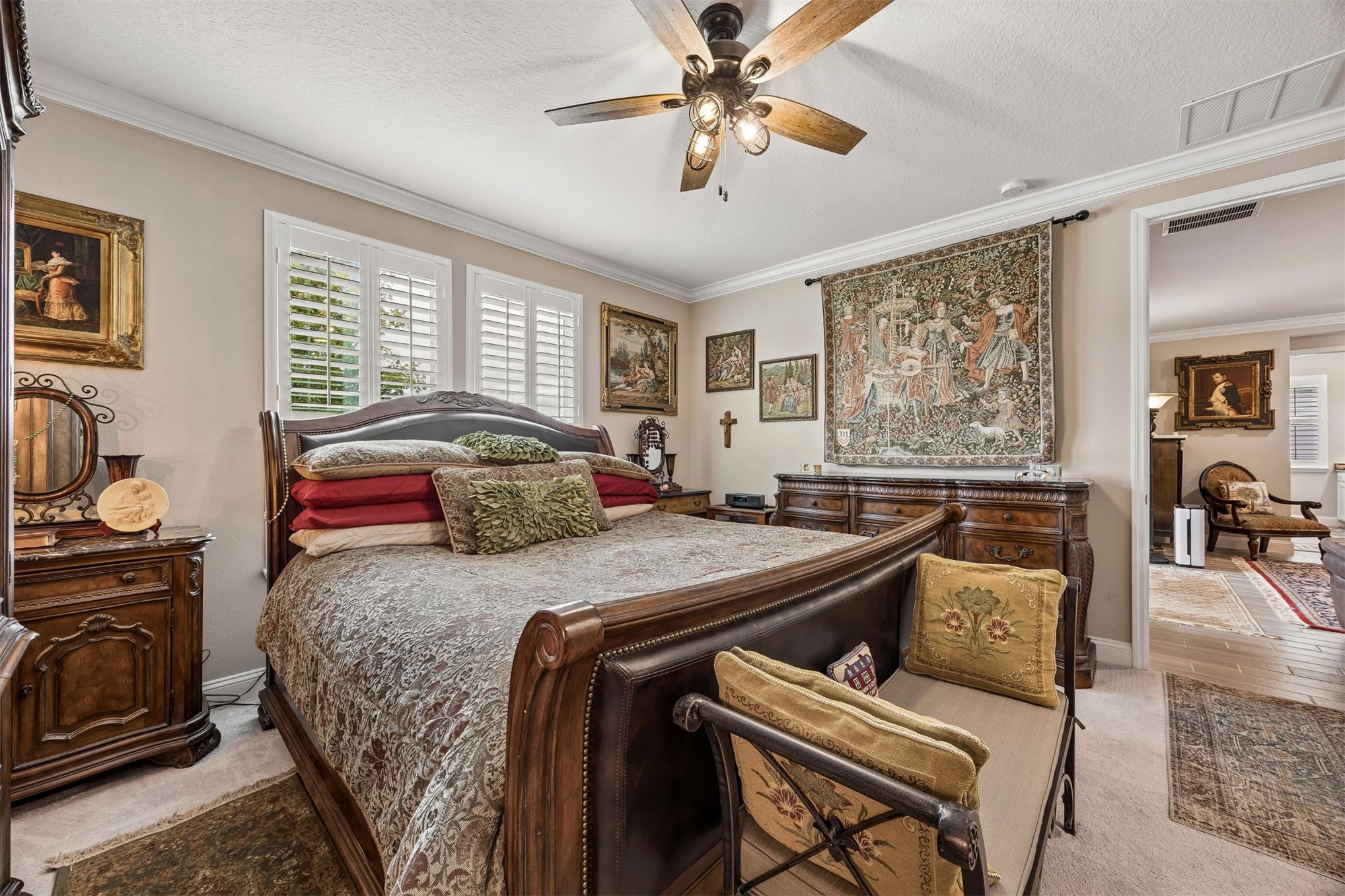 75133 Pondside Lane Yulee, FL 32097 - Photo 17 of 65 a bedroom with a bed and wooden floor