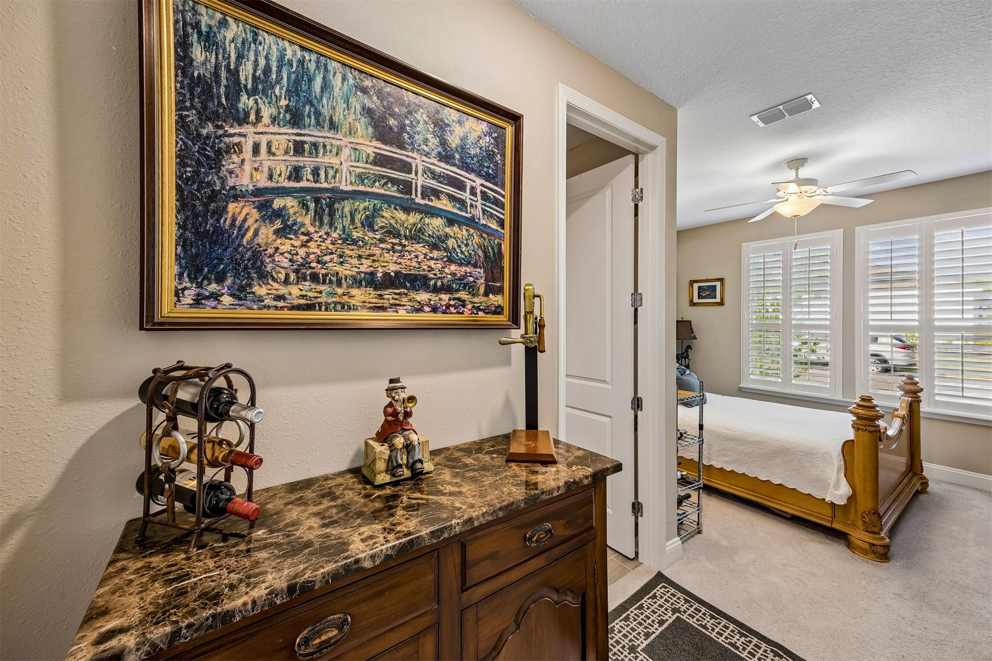 75133 Pondside Lane Yulee, FL 32097 - Photo 21 of 65 a living room with furniture and a painting on the wall
