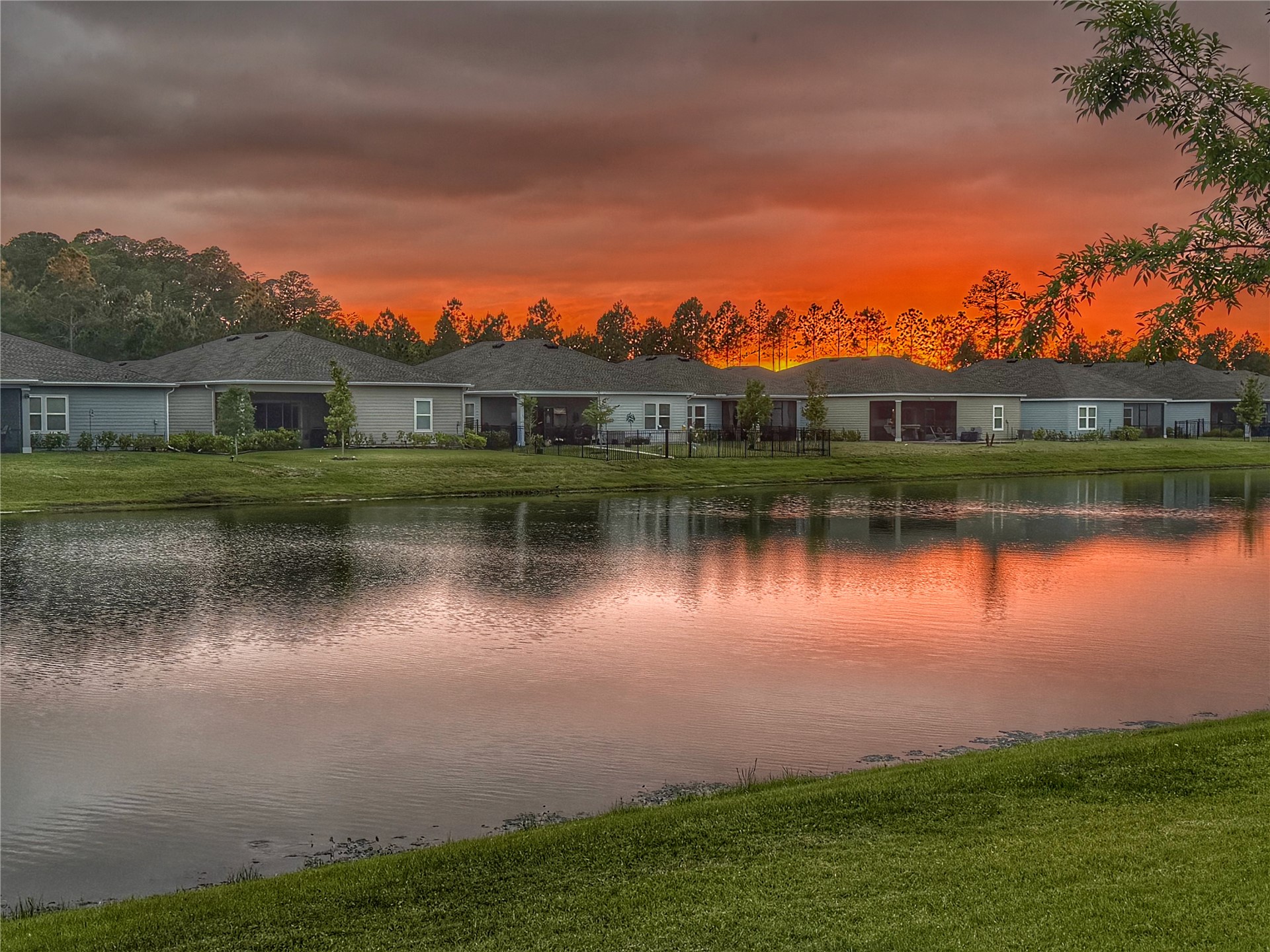 75133 Pondside Lane Yulee, FL 32097 - Photo 34 of 65 a view of a lake with a city view