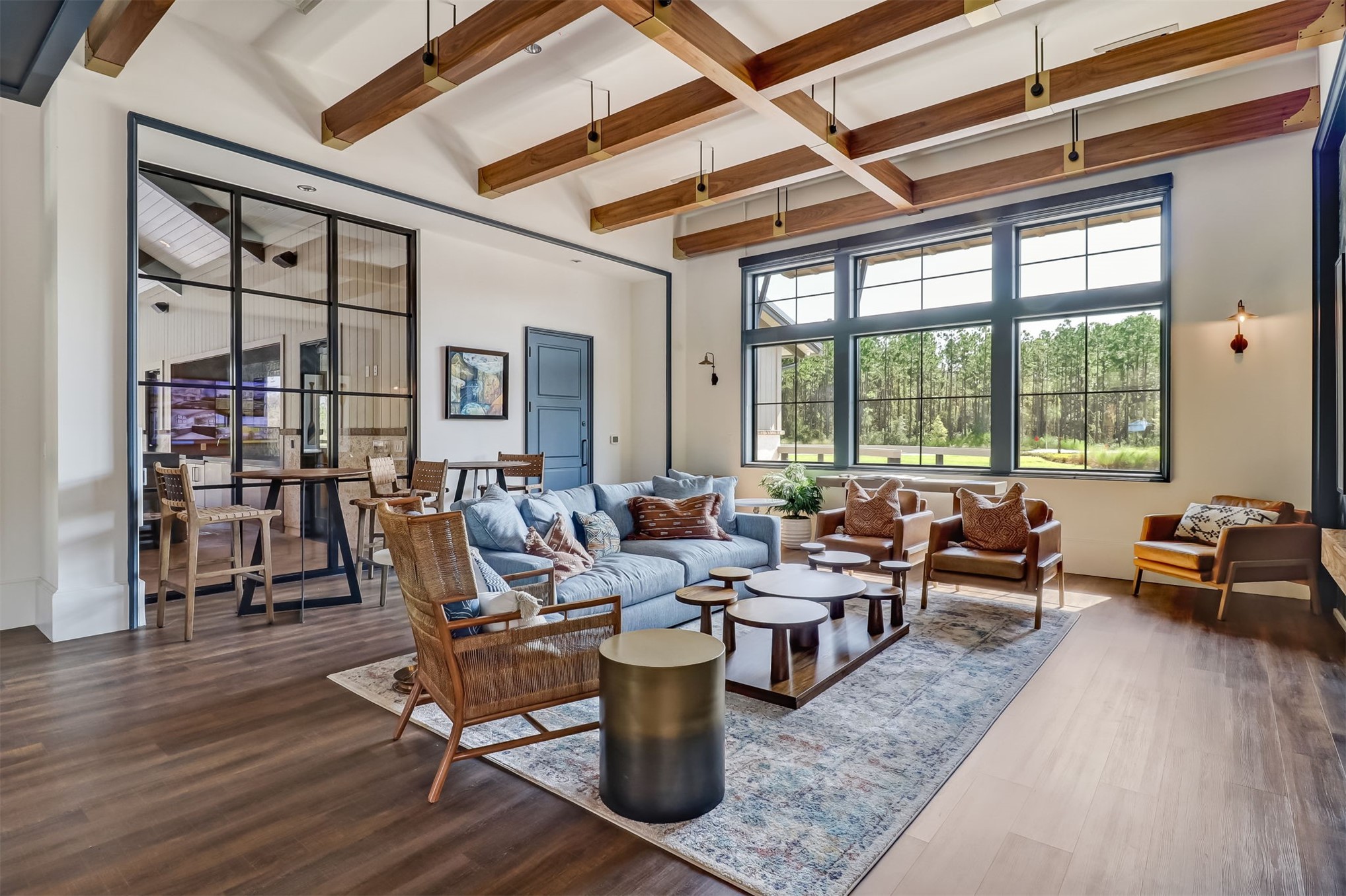 75133 Pondside Lane Yulee, FL 32097 - Photo 59 of 65 a living room with furniture wooden floor and a table