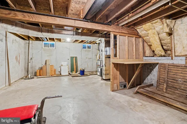a view of a room with wooden walls