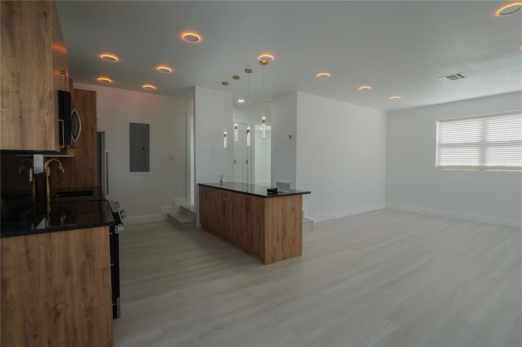 6821 Marius Road North Port, FL 34287 - Photo 11 of 39 a view of kitchen with refrigerator and window