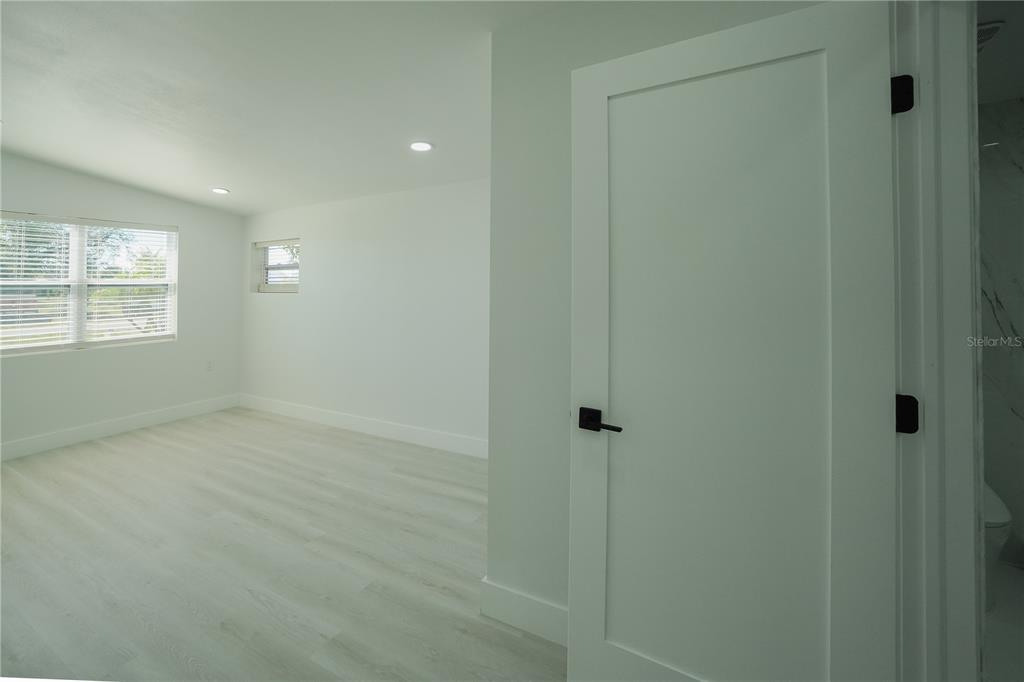 6821 Marius Road North Port, FL 34287 - Photo 17 of 39 a view of an empty room with a window