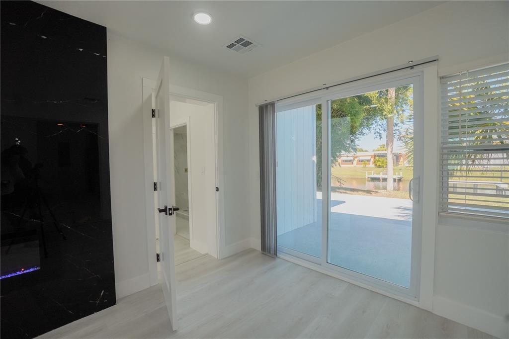 6821 Marius Road North Port, FL 34287 - Photo 19 of 39 a view of an empty room with a window