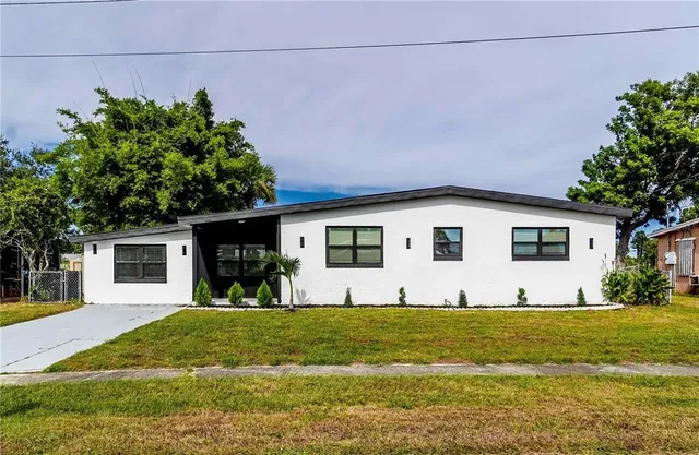 a front view of house with yard