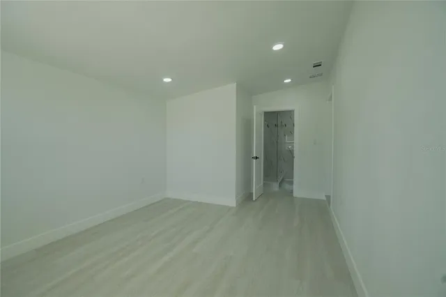 a bathroom with a shower and a toilet