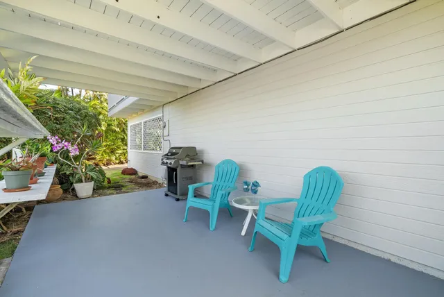 a view of a chairs and table in a room