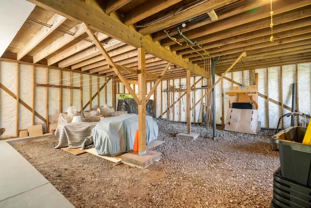 a view of a backyard of the house