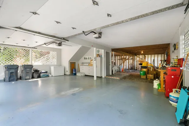 a view of a garage with gym equipment
