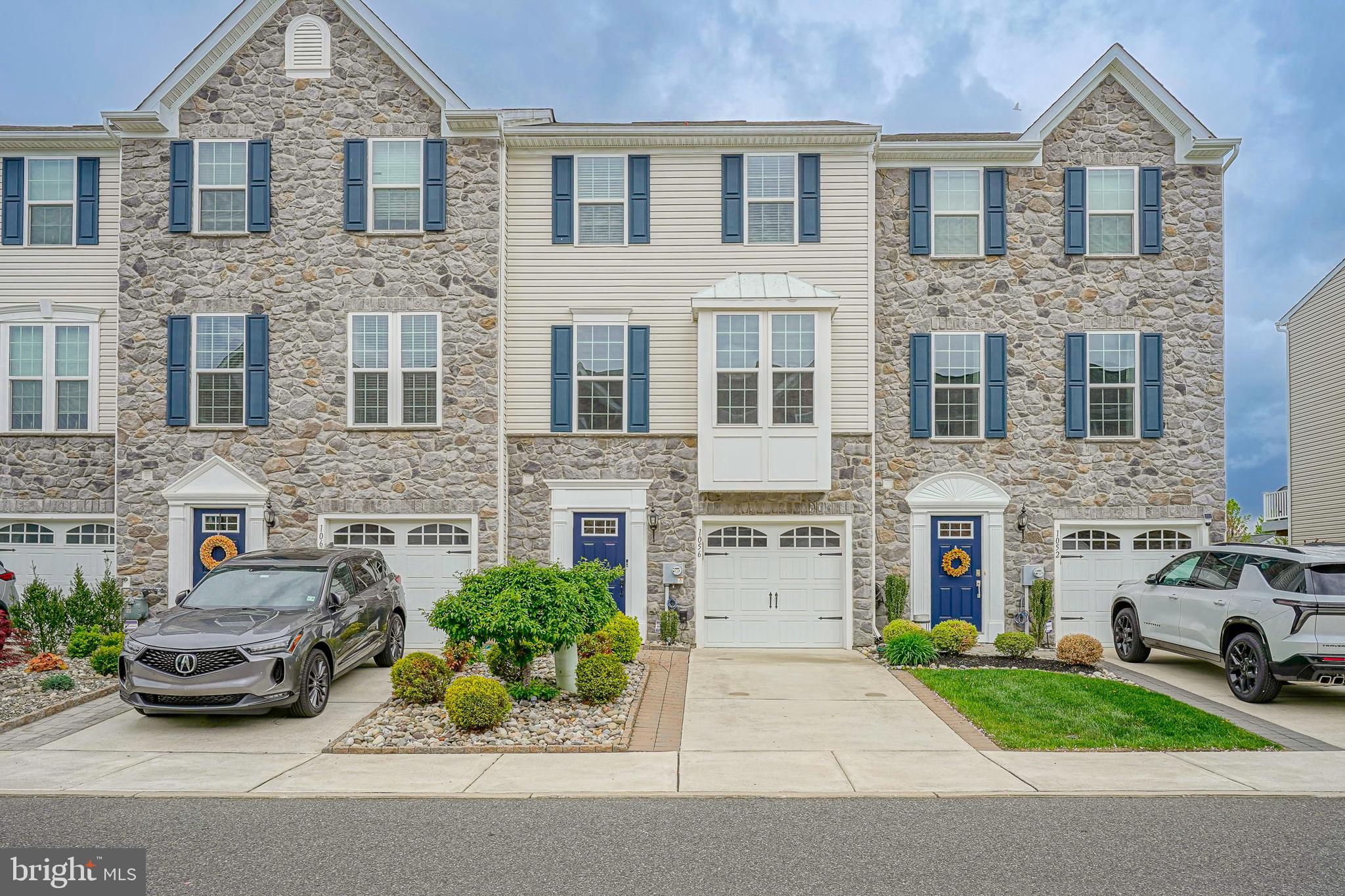 1056 Prime Place Sewell, NJ 08080 - Photo 1 of 41 a view of a car parked in front of a brick house