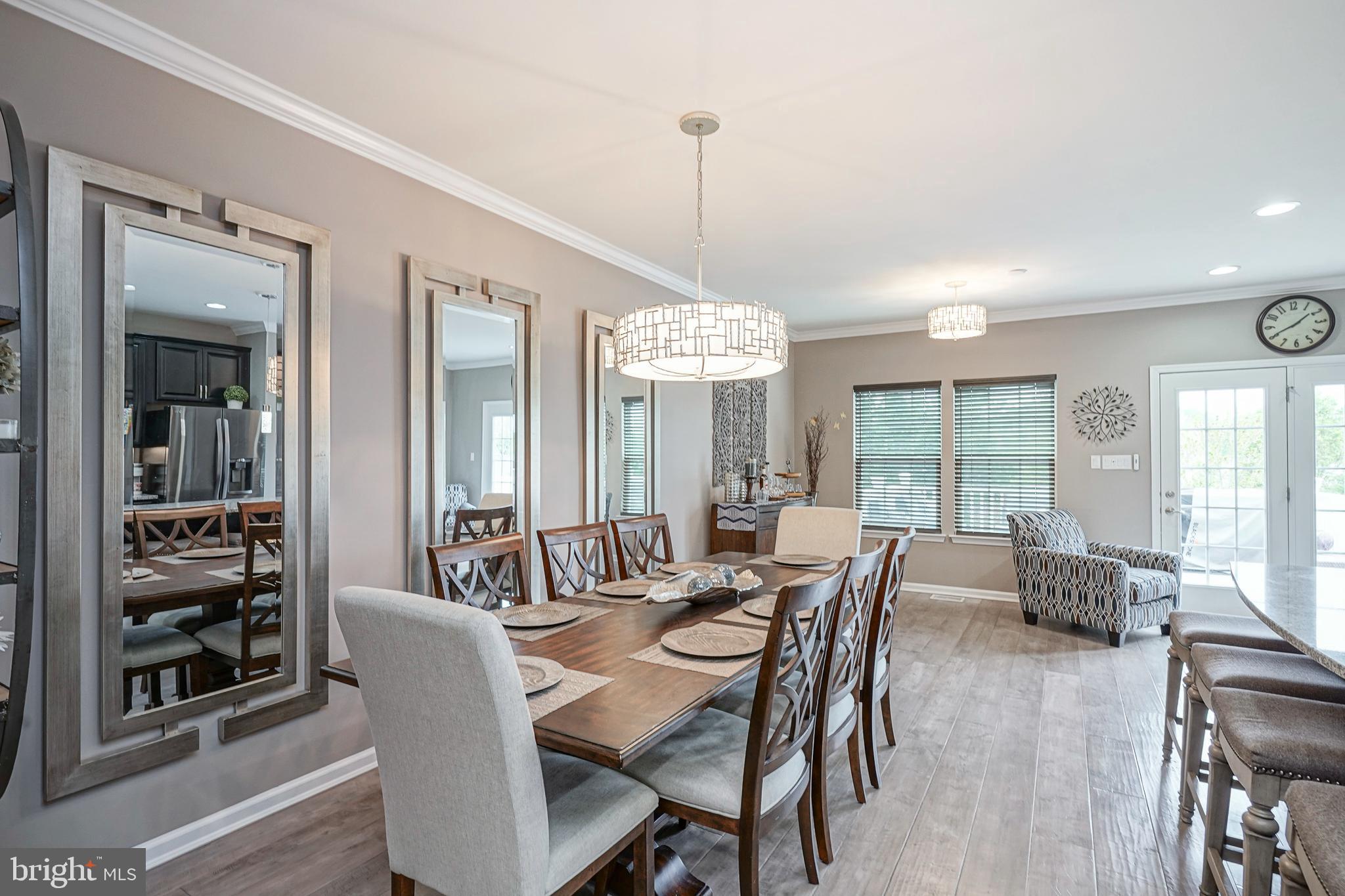 1056 Prime Place Sewell, NJ 08080 - Photo 12 of 41 a view of a dining room with furniture window and outside view