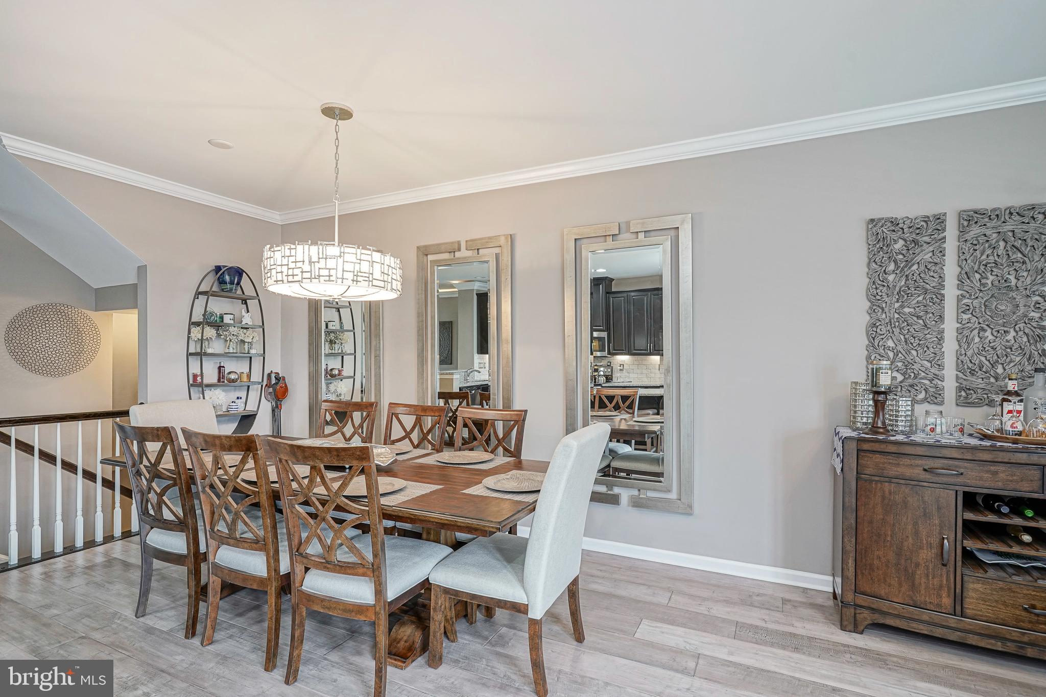 1056 Prime Place Sewell, NJ 08080 - Photo 18 of 41 a view of a dining room with furniture window and wooden floor
