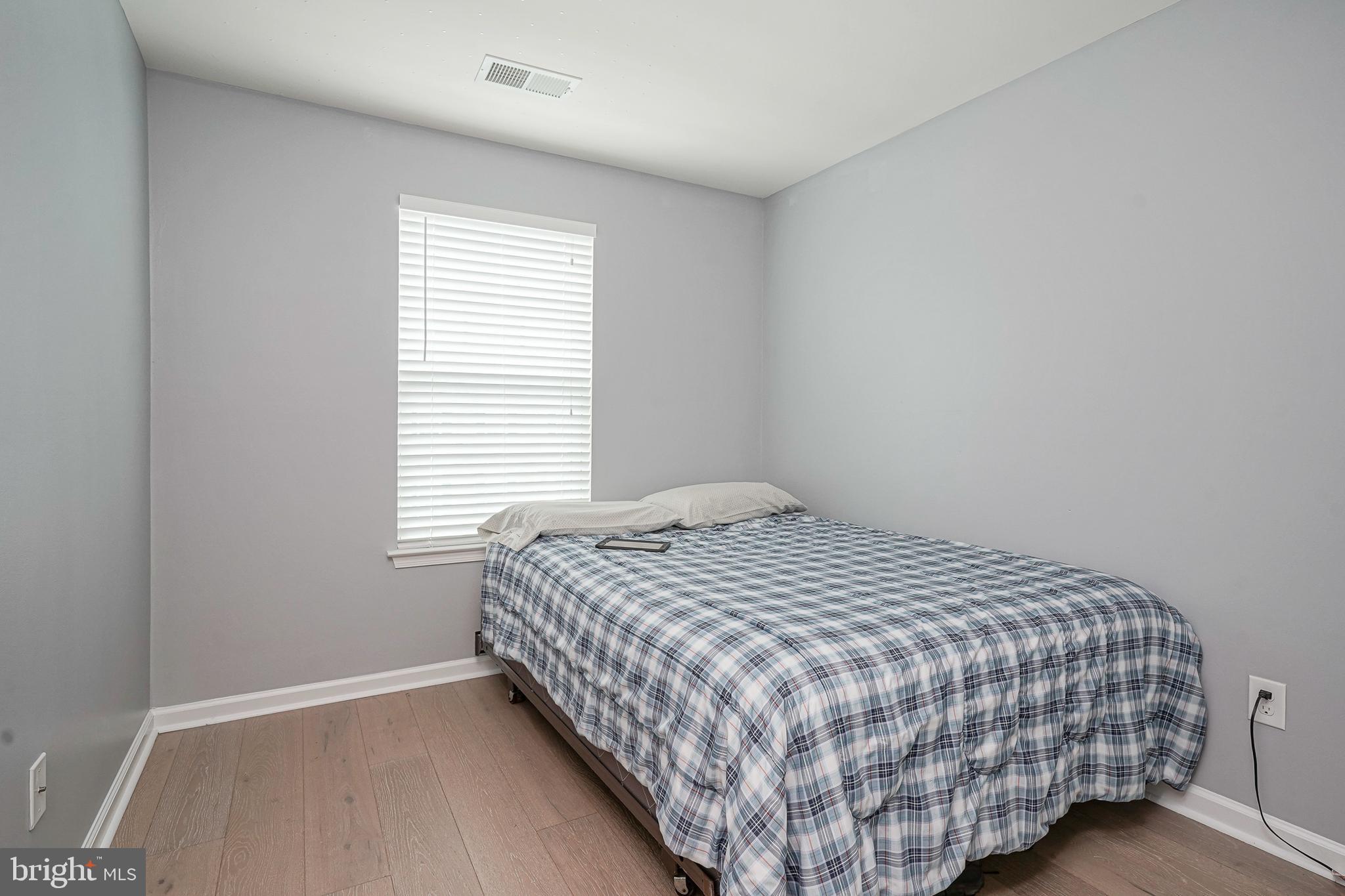 1056 Prime Place Sewell, NJ 08080 - Photo 27 of 41 a bedroom with a bed and a window
