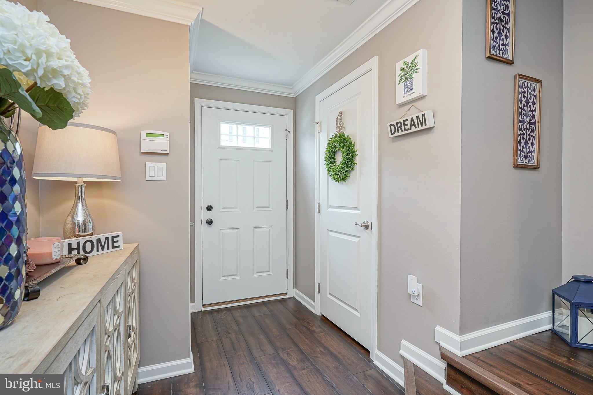 1056 Prime Place Sewell, NJ 08080 - Photo 3 of 41 a view of an entryway with wooden floor