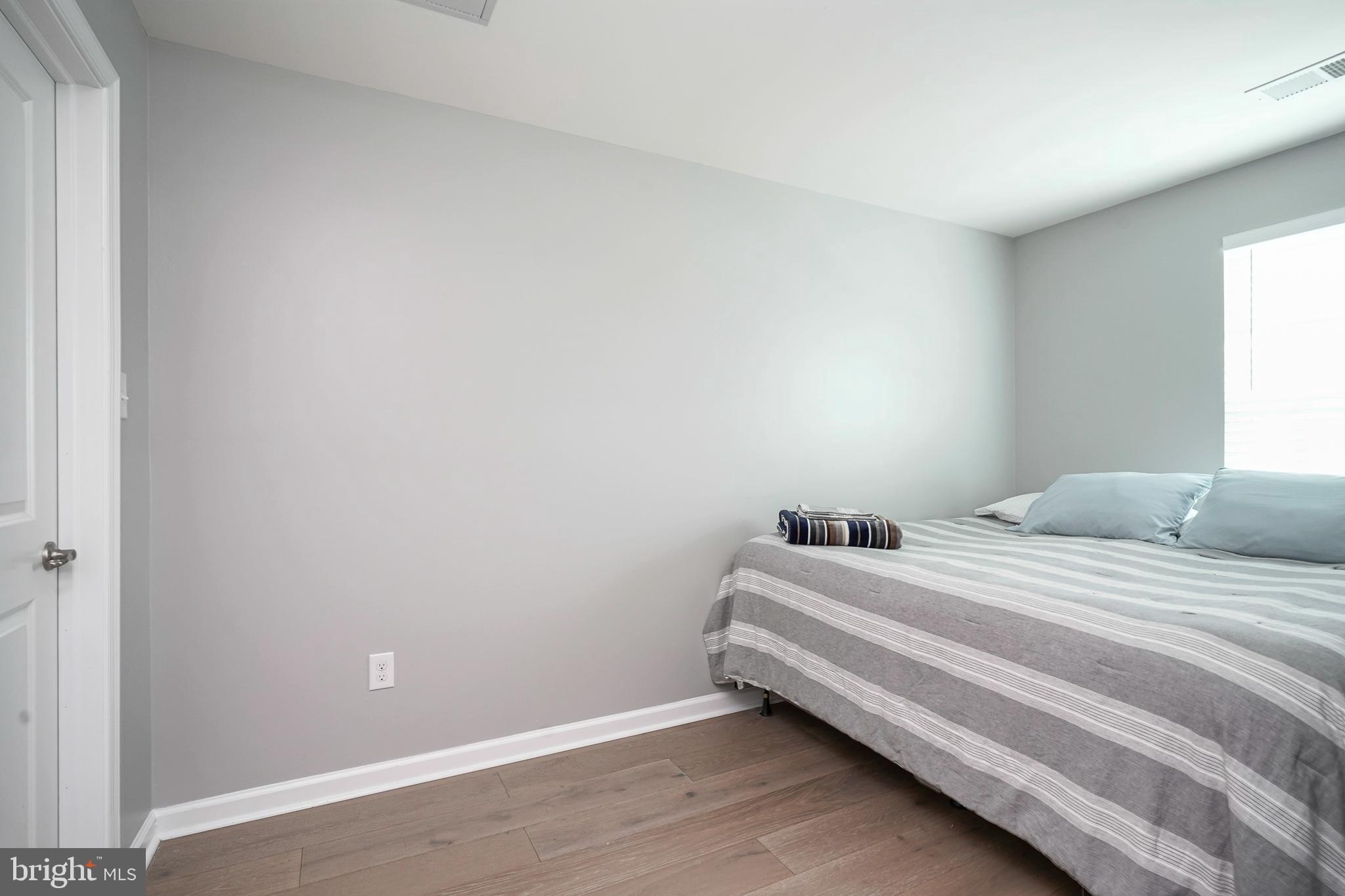 1056 Prime Place Sewell, NJ 08080 - Photo 33 of 41 a bedroom with a bed and a window