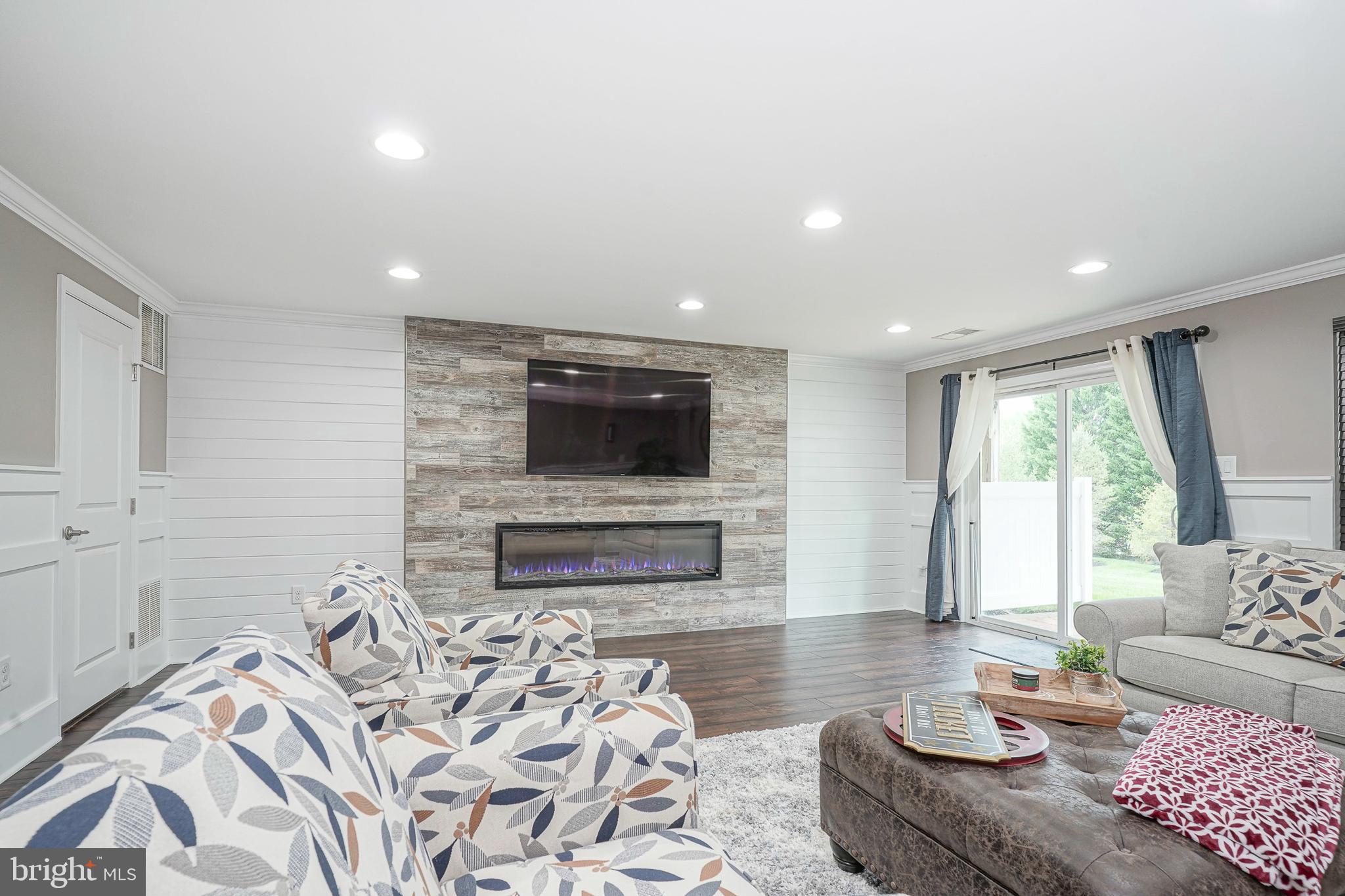 1056 Prime Place Sewell, NJ 08080 - Photo 7 of 41 a living room with furniture and a flat screen tv