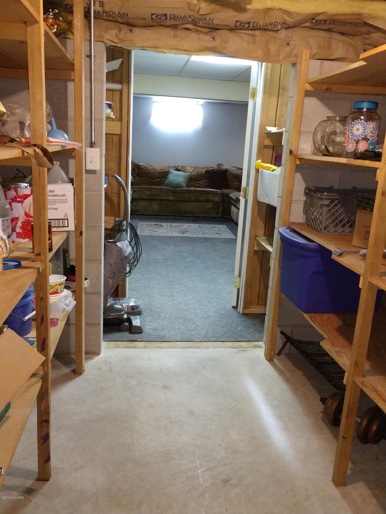 11000 Rainey Road Litchfield, MI 49252 - Photo 32 of 38 Basement Storage Area