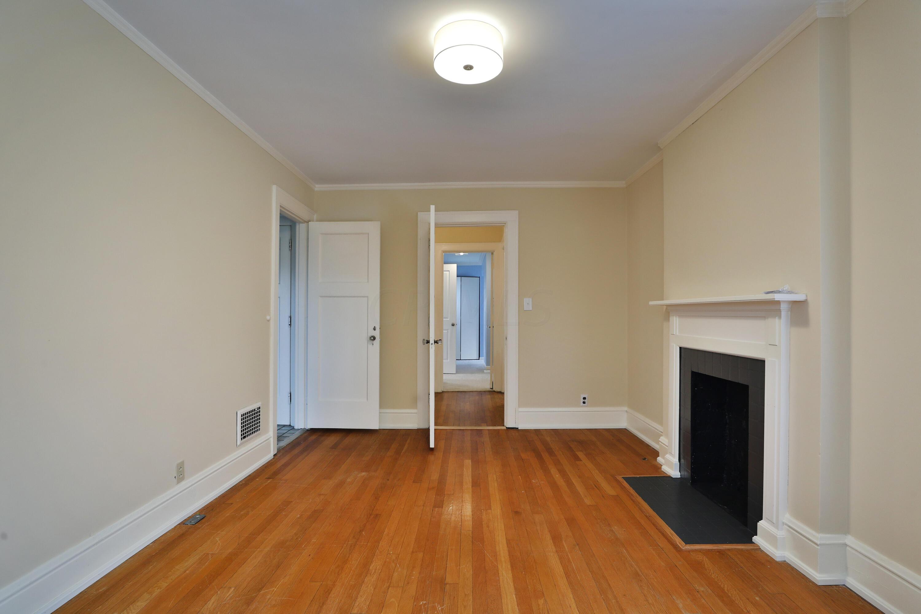 2180 Bryden Road Columbus, OH 43209 - Photo 31 of 56 Opens to Full bath. New overhead light, original hardwood doors.
