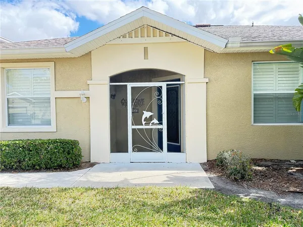 a front view of a house with a porch