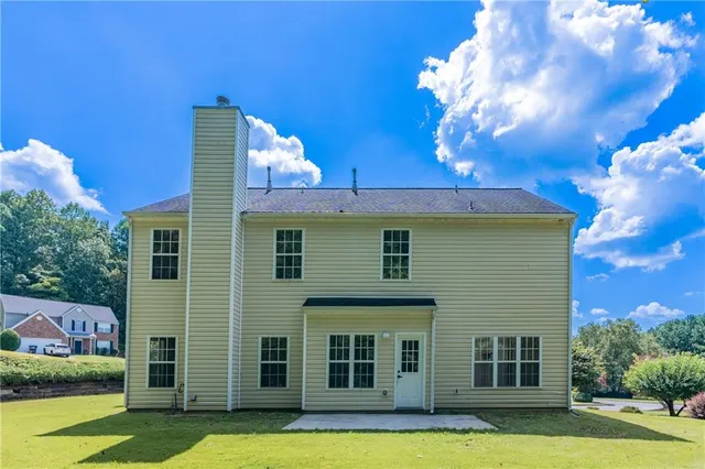 a view of a house with a swimming pool