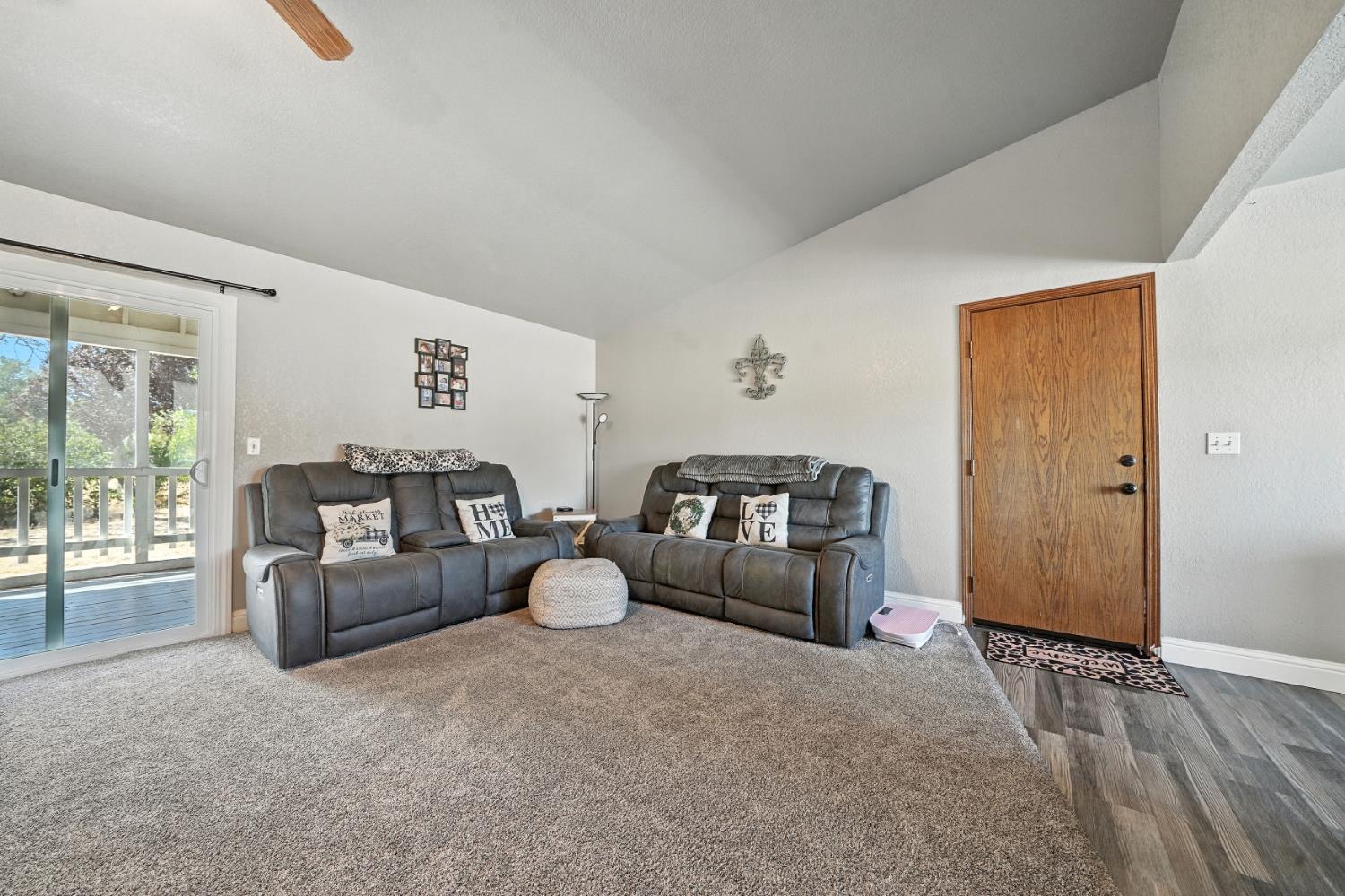 9680 Warren Road Valley Springs, CA 95252 - Photo 16 of 51 a living room with furniture and a window