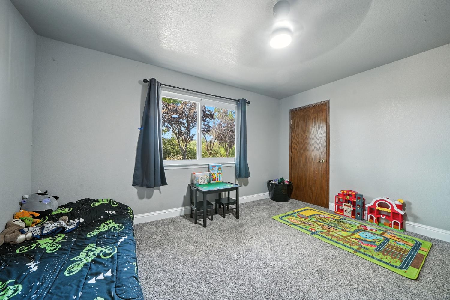 9680 Warren Road Valley Springs, CA 95252 - Photo 34 of 51 a living room with furniture